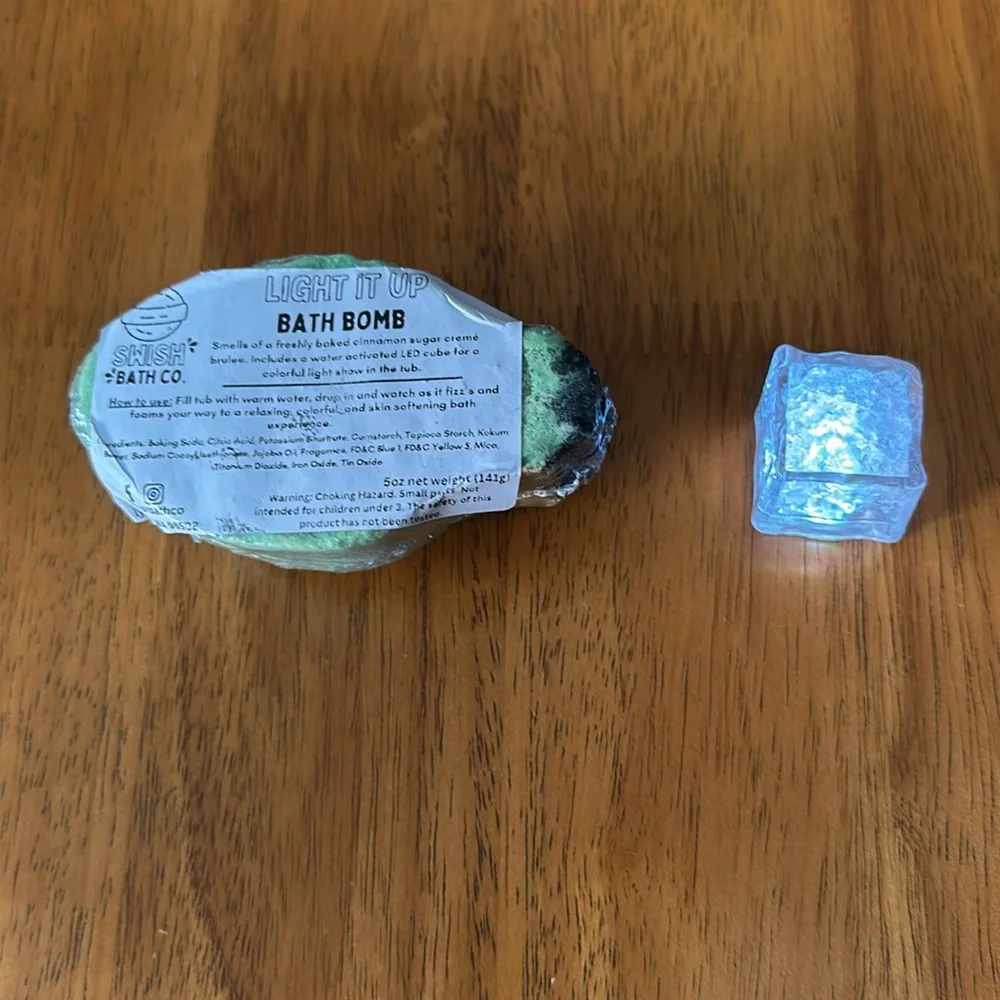 Bath bomb. Christmas bulb design with Christmas cookie smell. Lights up